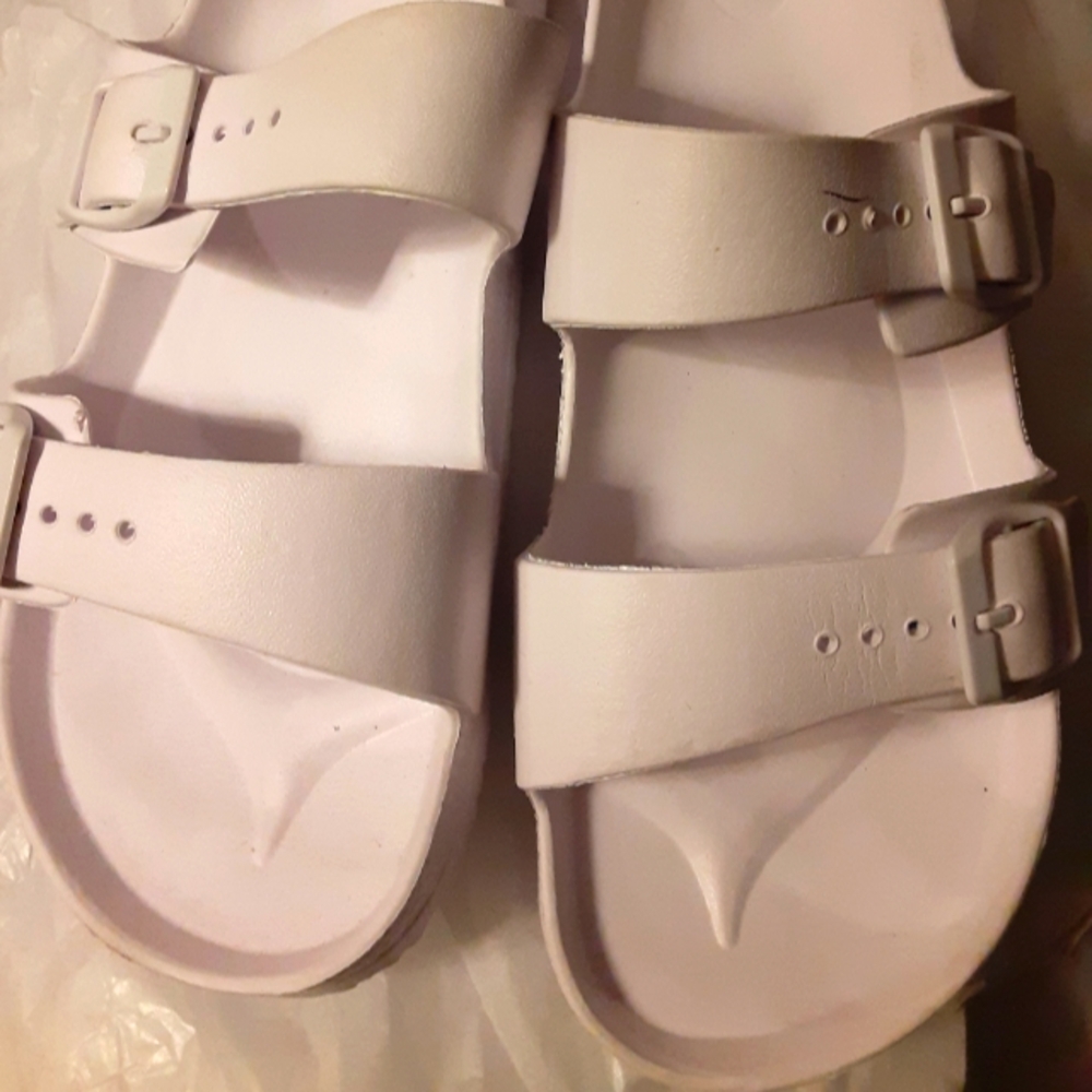 White 2 buckel sandal in size 11. Ladies size 11